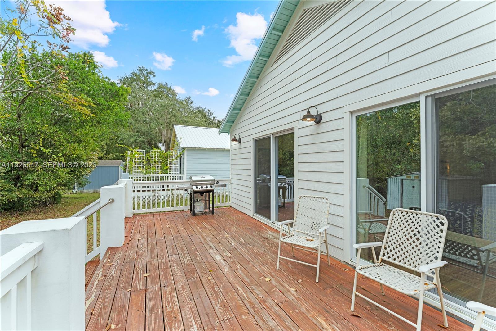 2 Poinciana Cove Road St. Augustine, FL 32084 - Photo 30 of 43 a view of a chairs with a deck