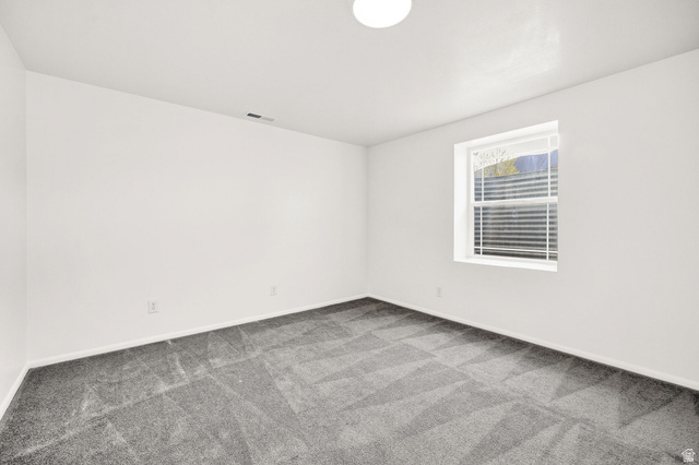 4155 Johnson Road Nibley, UT 84321 - Photo 40 of 71 Spare room featuring light carpet