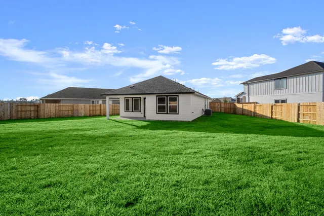 a view of a lake with a big yard