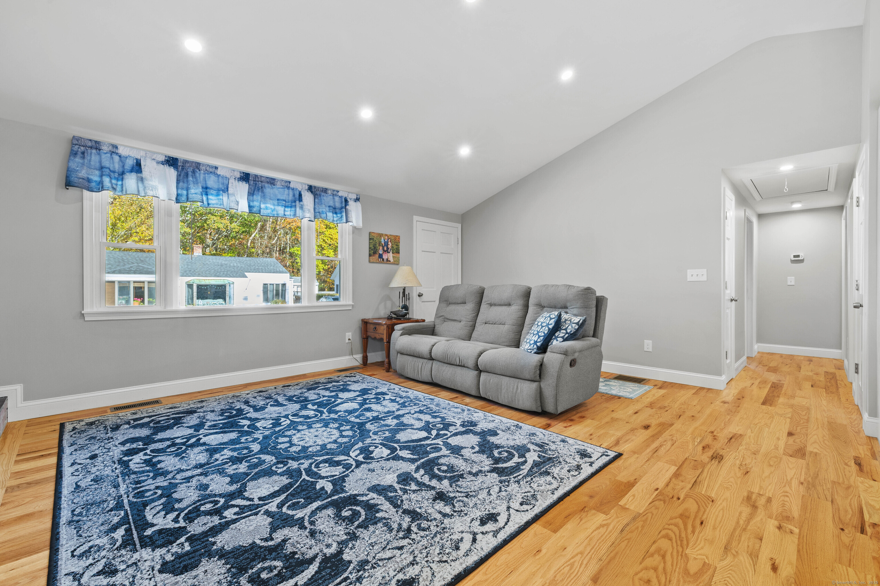 48 Billow Road East Lyme, CT 06357 - Photo 12 of 40 a bedroom with a bed and a couch