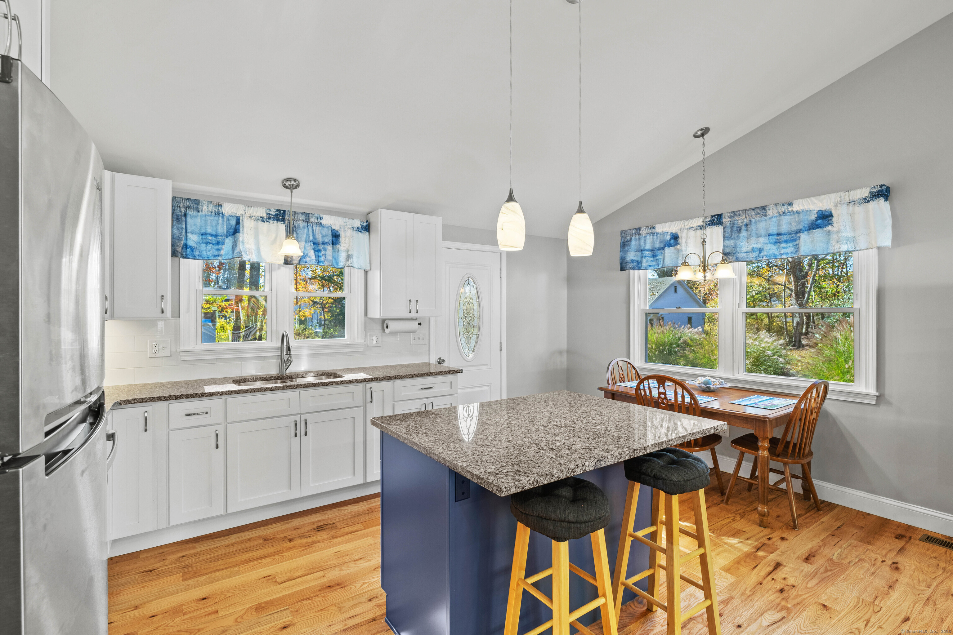 48 Billow Road East Lyme, CT 06357 - Photo 17 of 40 a kitchen with granite countertop a sink and a stove