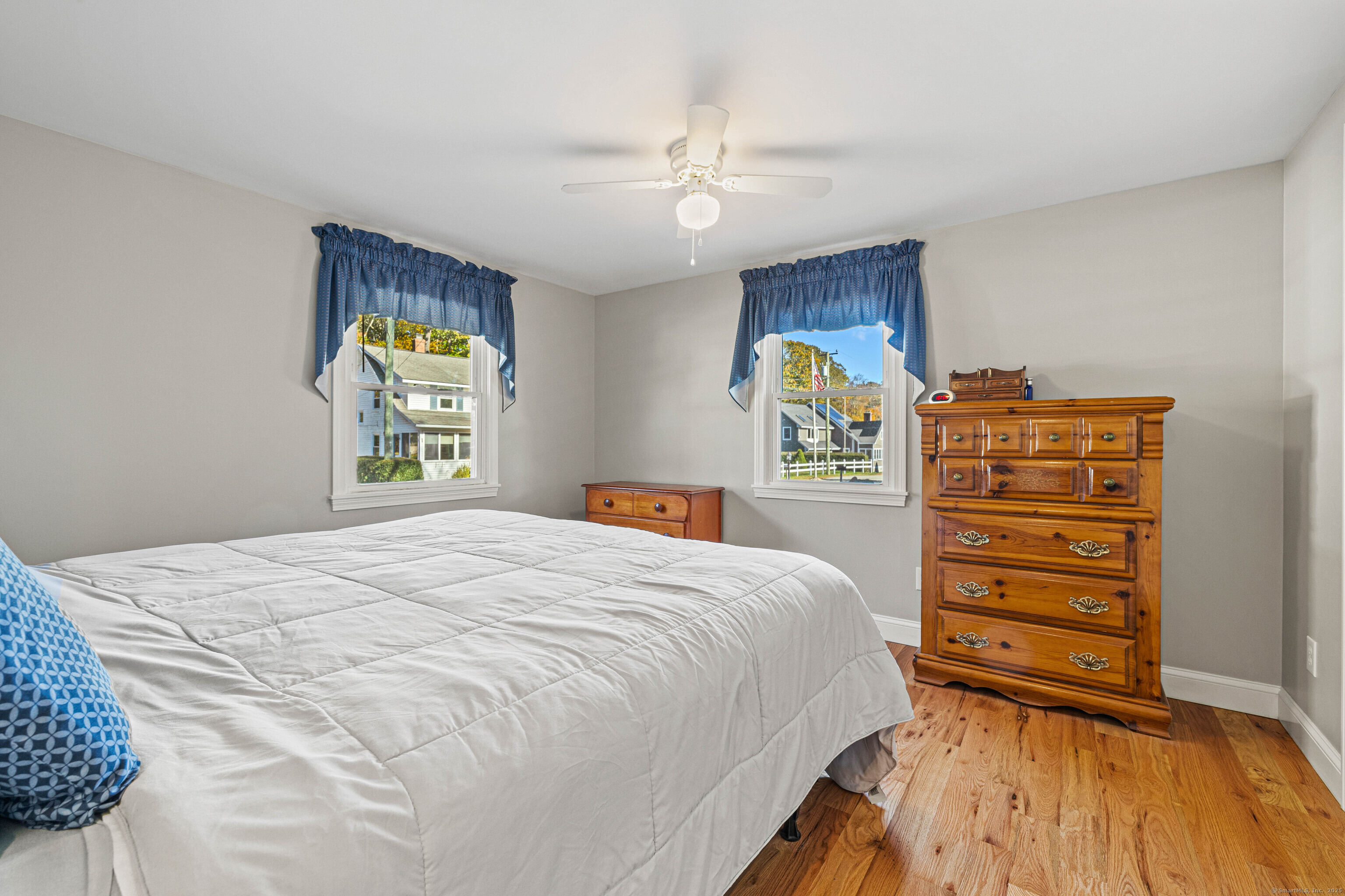 48 Billow Road East Lyme, CT 06357 - Photo 20 of 40 a bedroom with a bed and a dresser