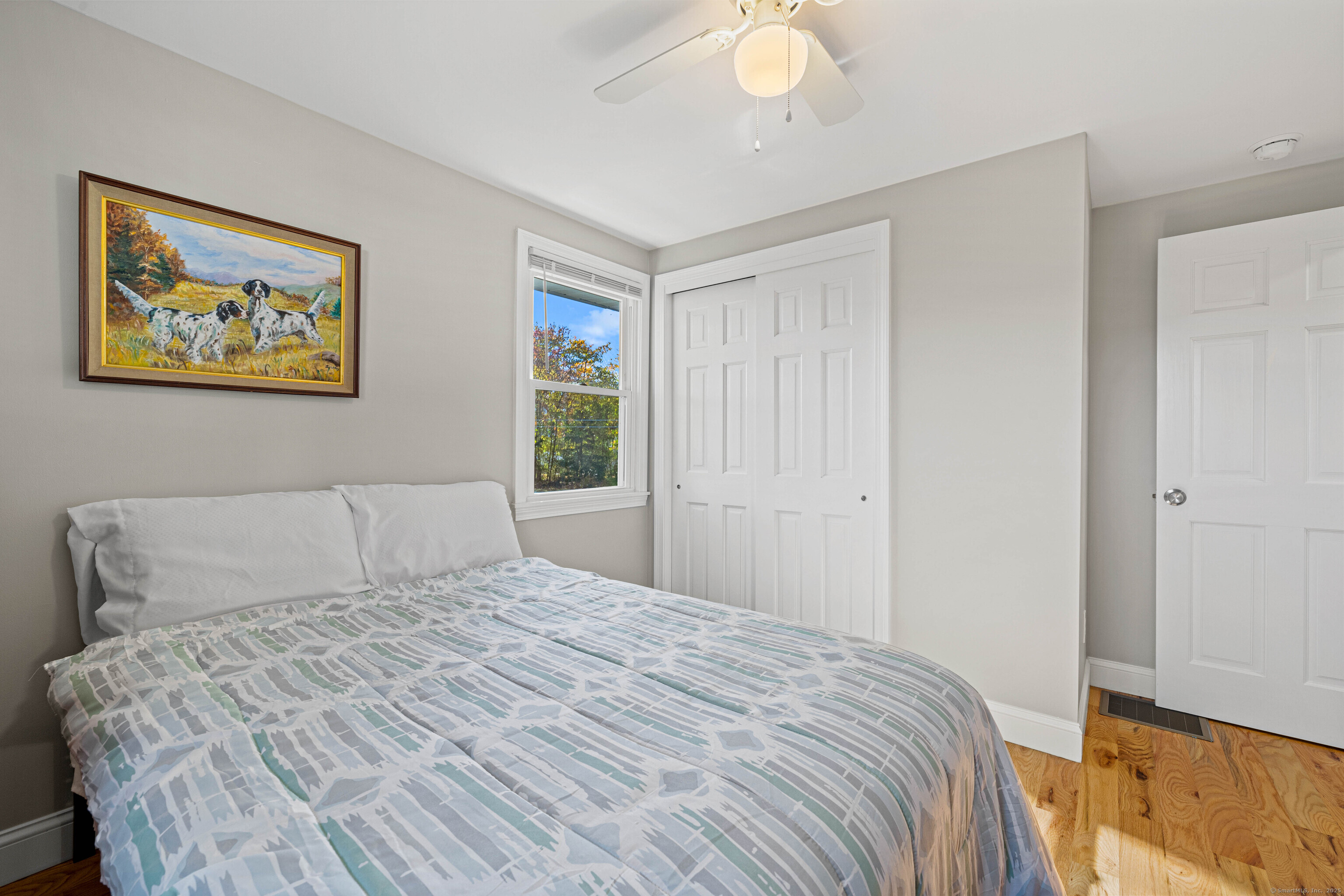48 Billow Road East Lyme, CT 06357 - Photo 25 of 40 a bedroom with a bed and a window