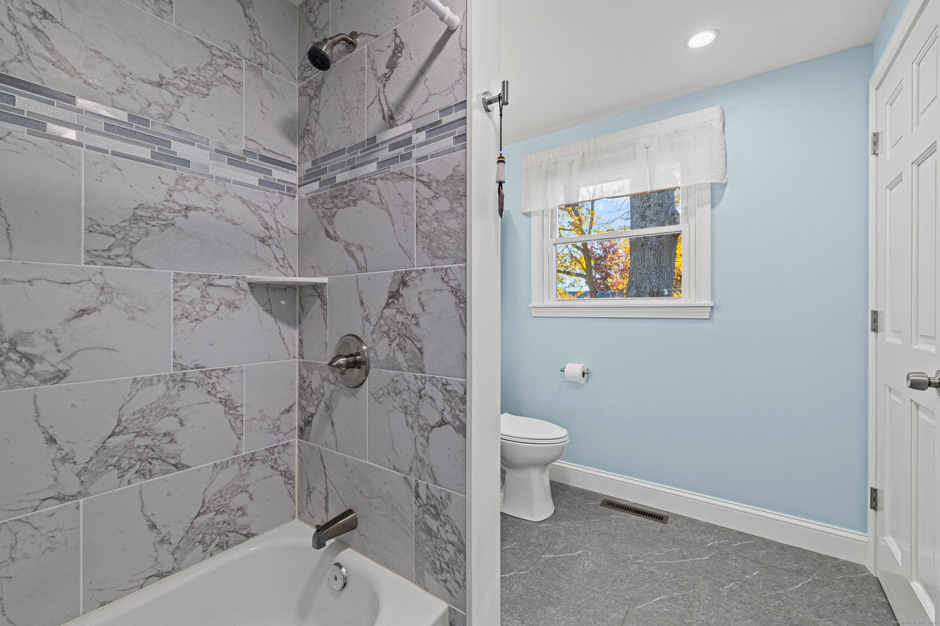 48 Billow Road East Lyme, CT 06357 - Photo 27 of 40 a bathroom with a toilet sink and shower