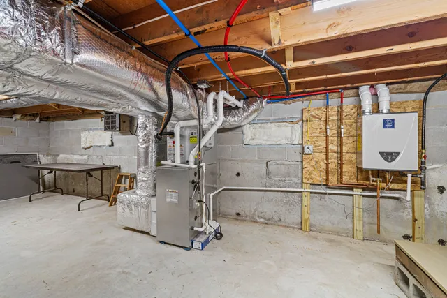 a view of empty room with wooden ceiling