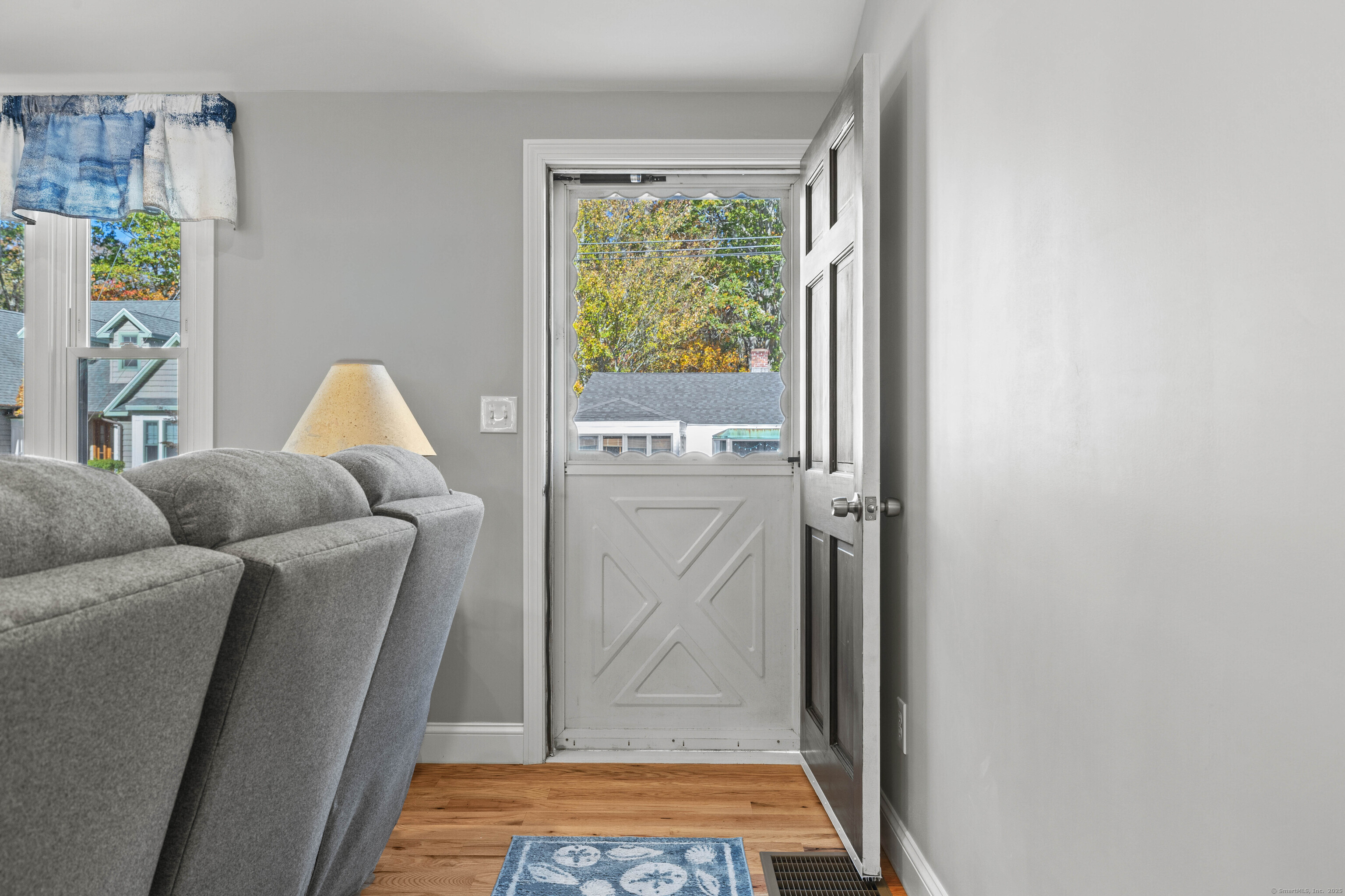 48 Billow Road East Lyme, CT 06357 - Photo 7 of 40 a living room with furniture and a window