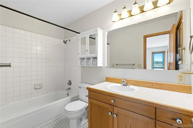 a bathroom with a sink a toilet and a bathtub