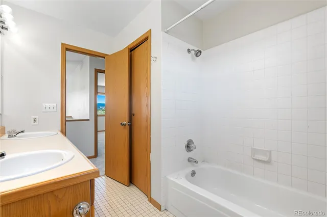 a bathroom with a sink and a bathtub