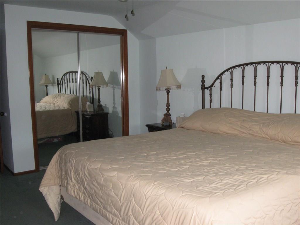 2040 Spring Valley Road Pittsburgh, PA 15243 - Photo 13 of 23 a bedroom with a bed and window
