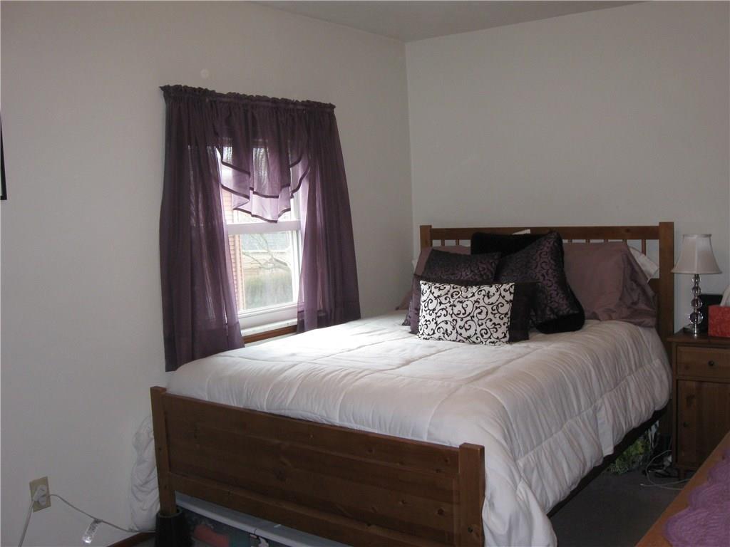 2040 Spring Valley Road Pittsburgh, PA 15243 - Photo 14 of 23 a bedroom with a bed and window