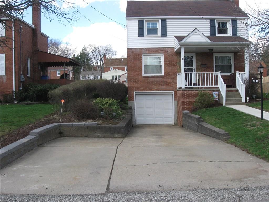 2040 Spring Valley Road Pittsburgh, PA 15243 - Photo 21 of 23 a front view of a house with a yard