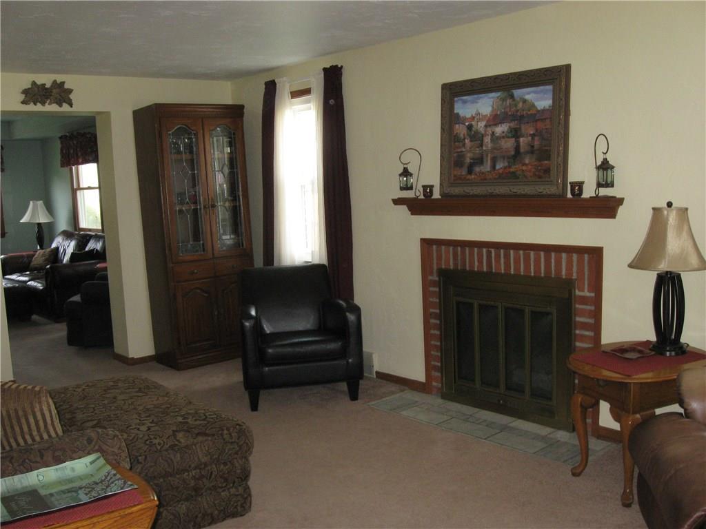 2040 Spring Valley Road Pittsburgh, PA 15243 - Photo 3 of 23 a living room with furniture and a fireplace