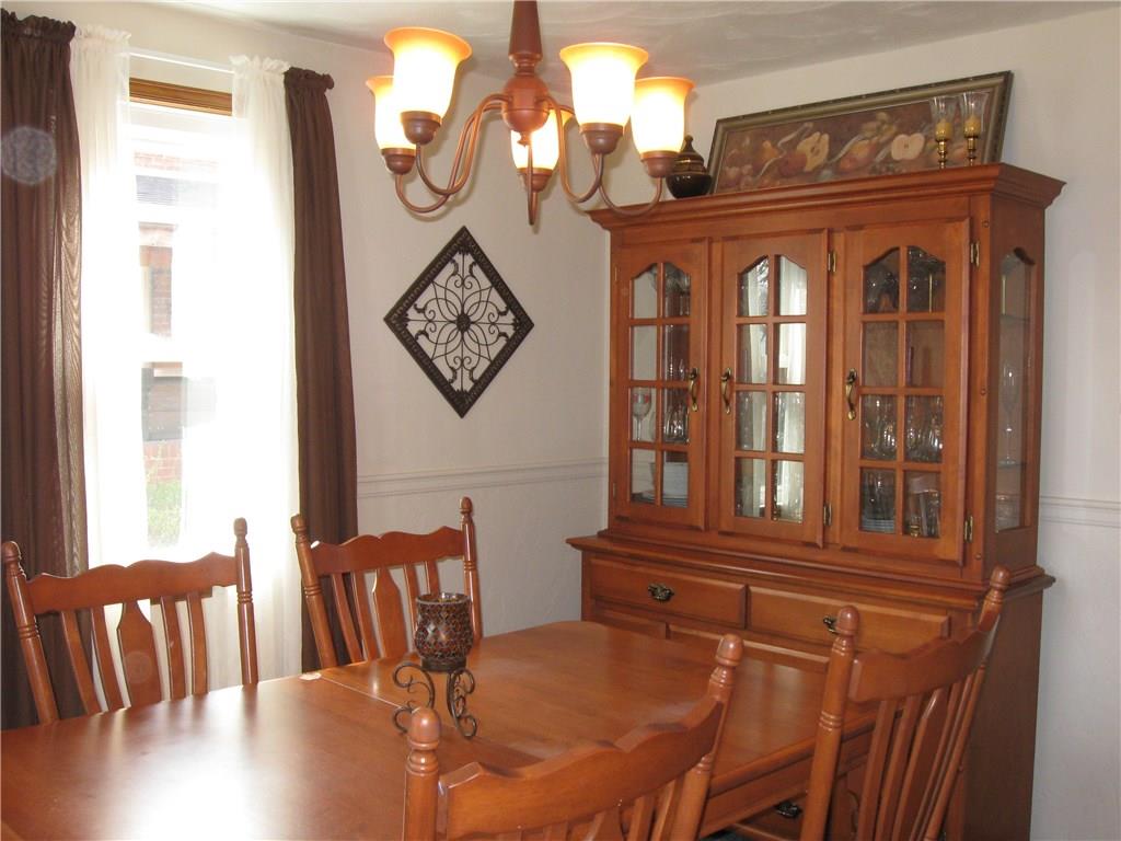 2040 Spring Valley Road Pittsburgh, PA 15243 - Photo 4 of 23 a view of a dining room with furniture window and wooden floor