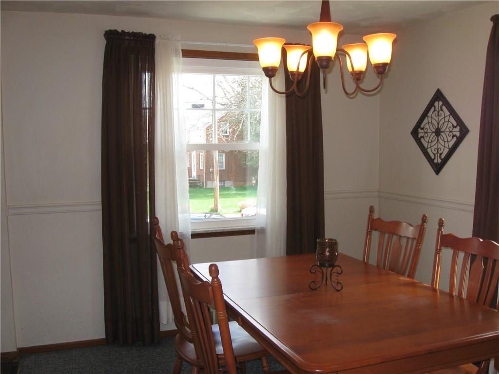 2040 Spring Valley Road Pittsburgh, PA 15243 - Photo 5 of 23 a view of a dining room with furniture window and outside view