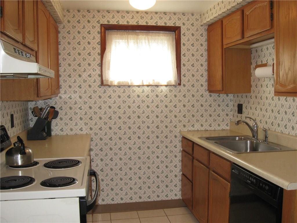 2040 Spring Valley Road Pittsburgh, PA 15243 - Photo 8 of 23 a bathroom with a sink a vanity and granite