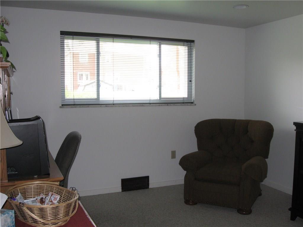 2040 Spring Valley Road Pittsburgh, PA 15243 - Photo 10 of 23 a living room with furniture and a window