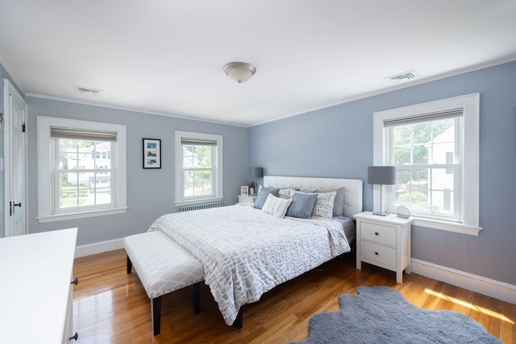 1054 Brook Road Milton, MA 02186 - Photo 10 of 23 a bedroom with a bed and a window