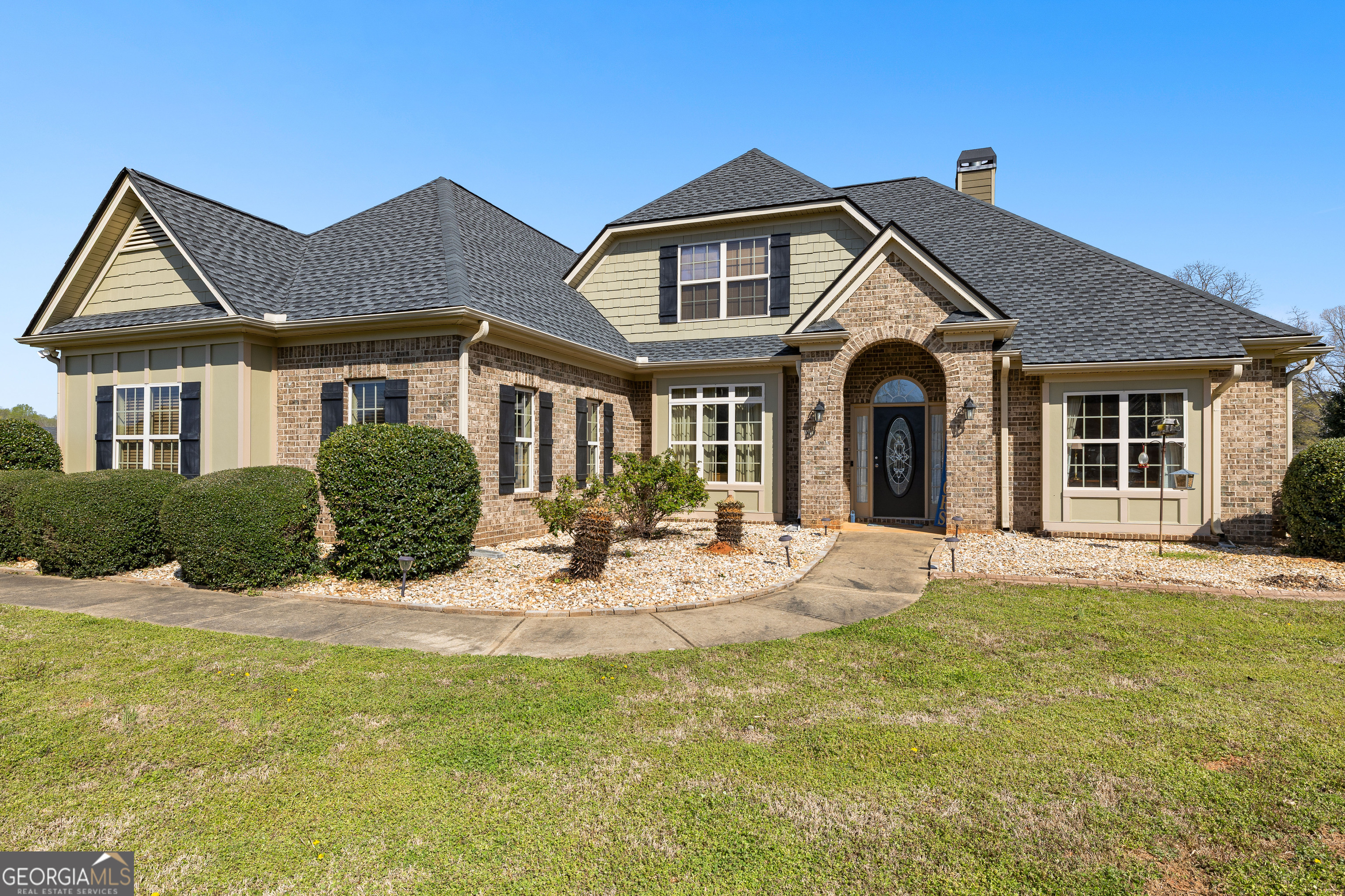 21 Hunters Overlook Drive Senoia, GA 30276 - Photo 1 of 37 a view of a yard in front of a house