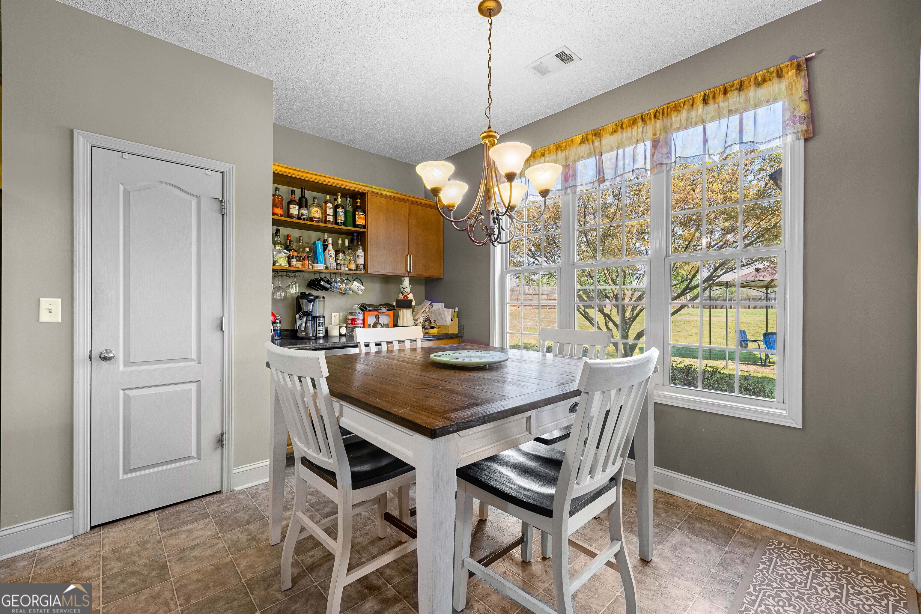 21 Hunters Overlook Drive Senoia, GA 30276 - Photo 12 of 37 a view of a dining room with furniture window and outside view