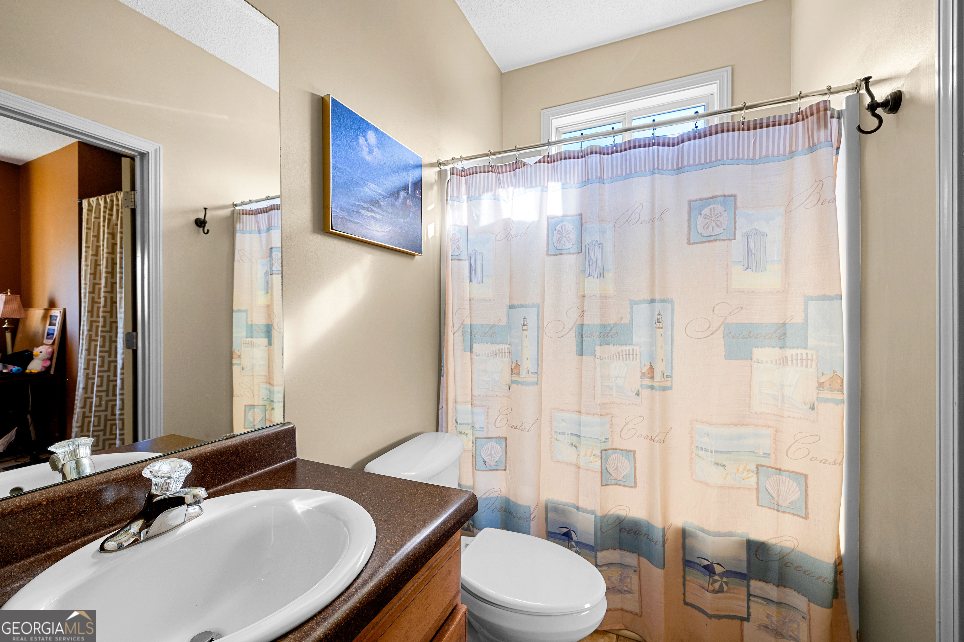 21 Hunters Overlook Drive Senoia, GA 30276 - Photo 26 of 37 a bathroom with a sink a toilet and shower