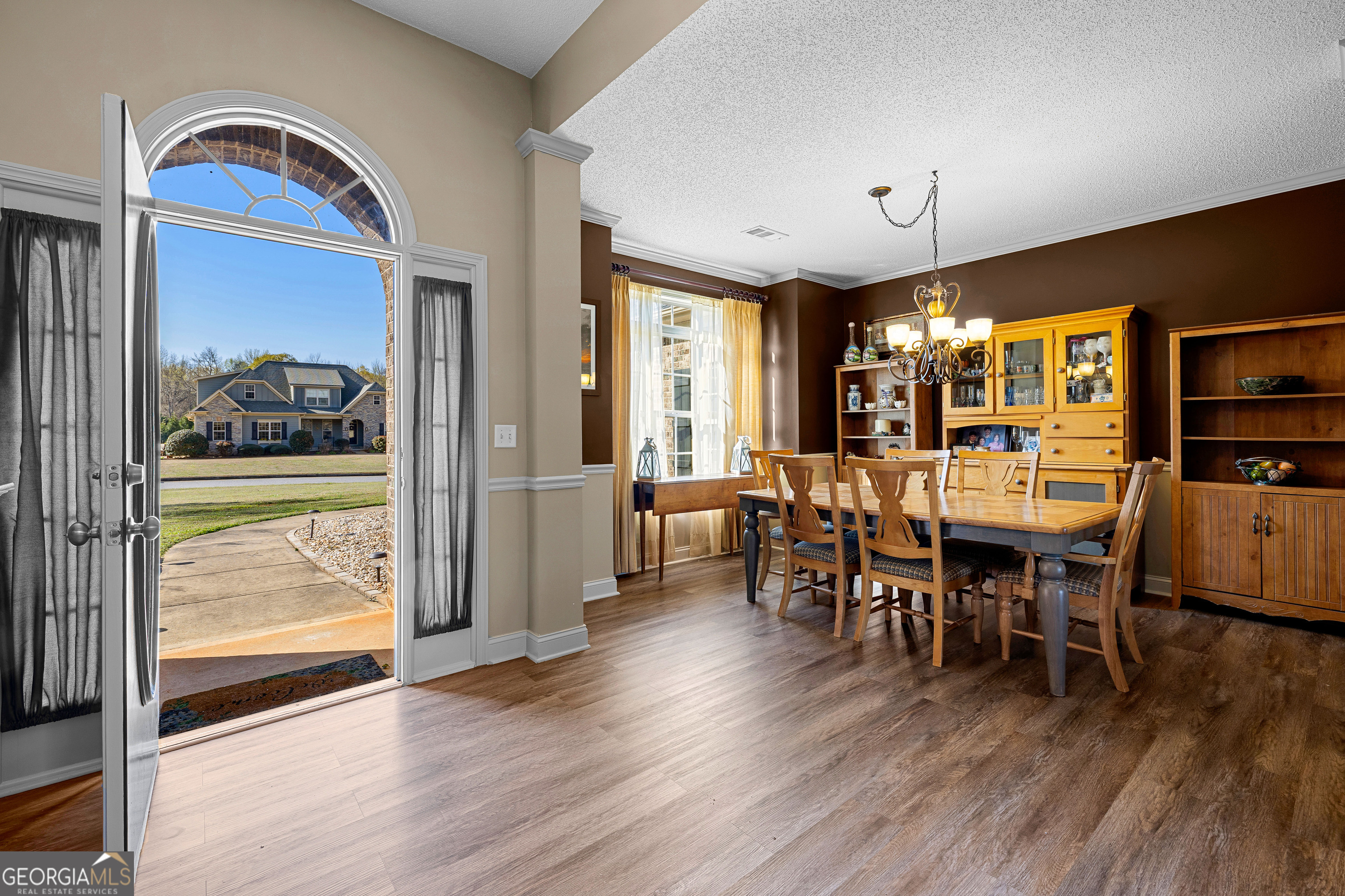 21 Hunters Overlook Drive Senoia, GA 30276 - Photo 5 of 37 a view of a a dining room with furniture window and wooden floor