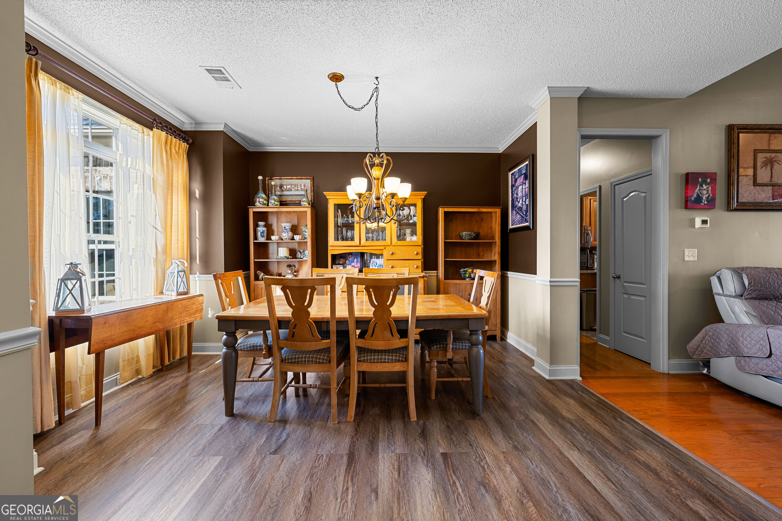 21 Hunters Overlook Drive Senoia, GA 30276 - Photo 6 of 37 a dining room with furniture window wooden floor