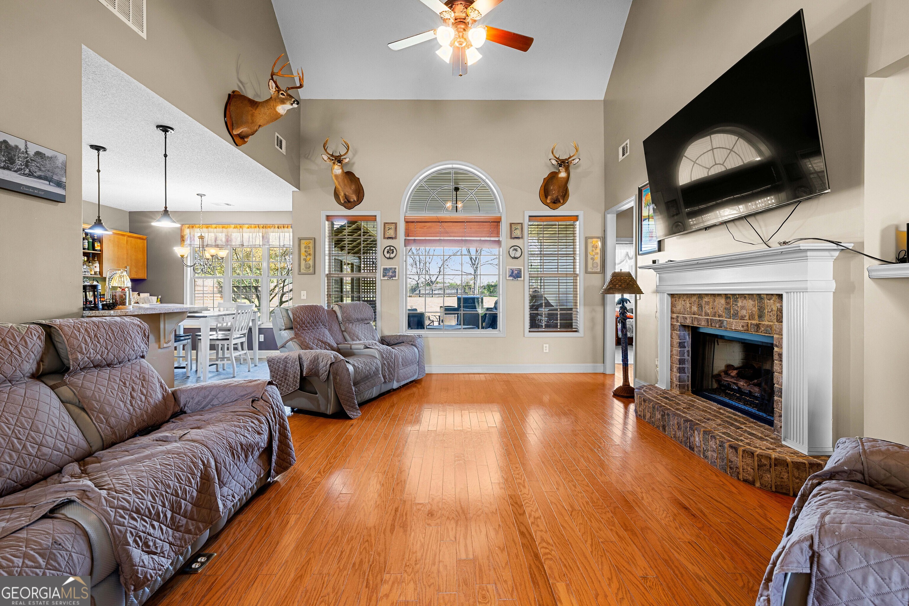 21 Hunters Overlook Drive Senoia, GA 30276 - Photo 7 of 37 a living room with furniture fireplace and flat screen tv
