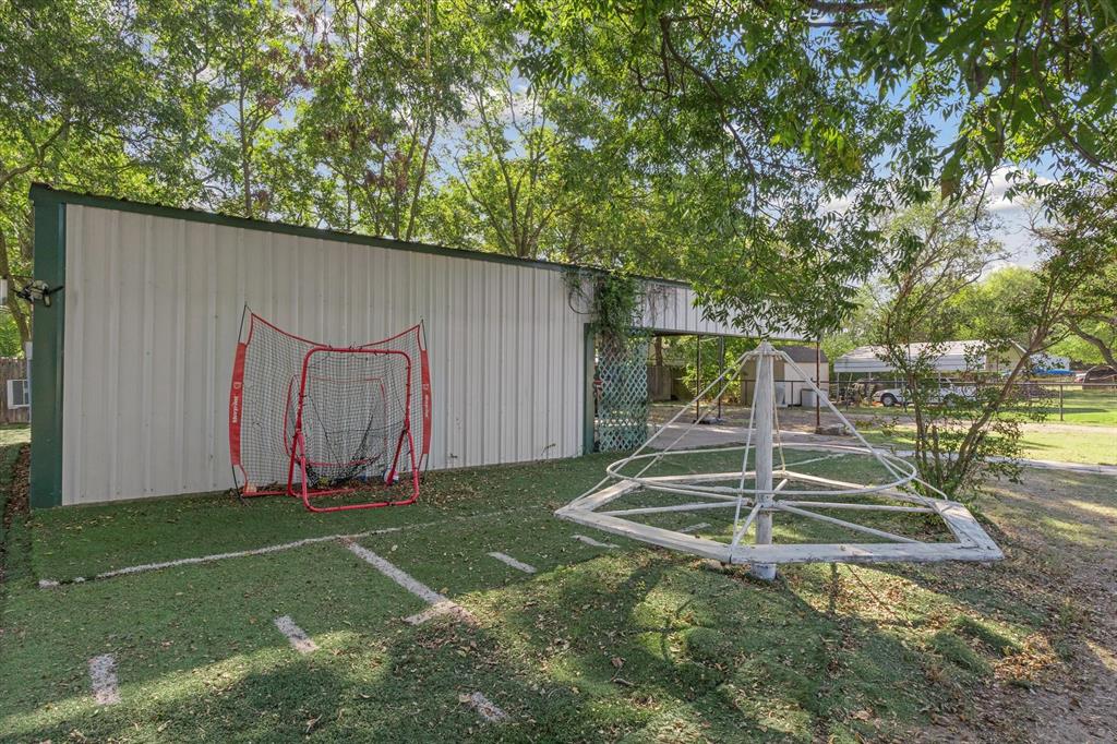 503 South Houston Street Edgewood, TX 75117 - Photo 25 of 31 a view of a backyard