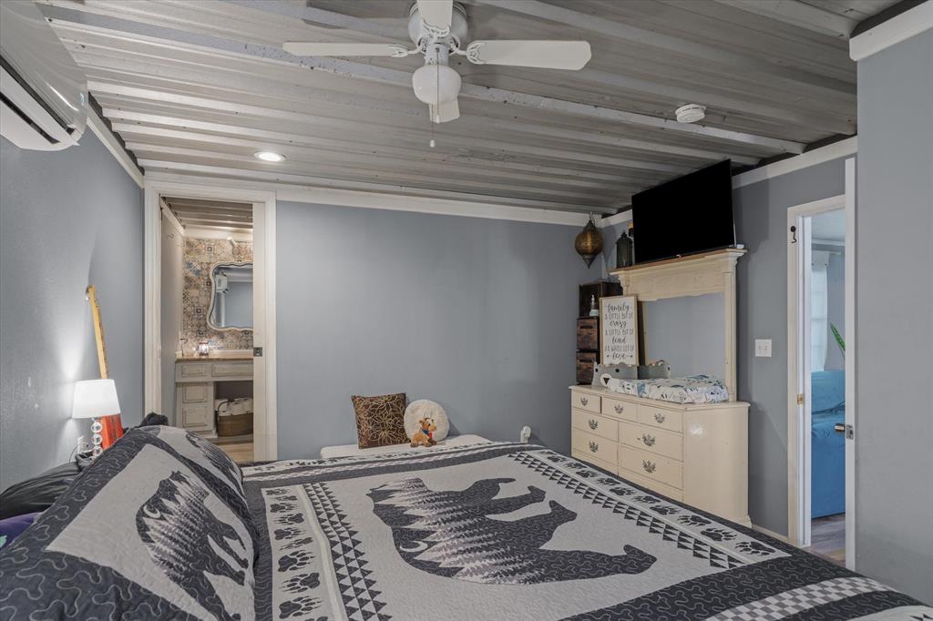 503 South Houston Street Edgewood, TX 75117 - Photo 9 of 31 a living room with hard wood flooring and furniture