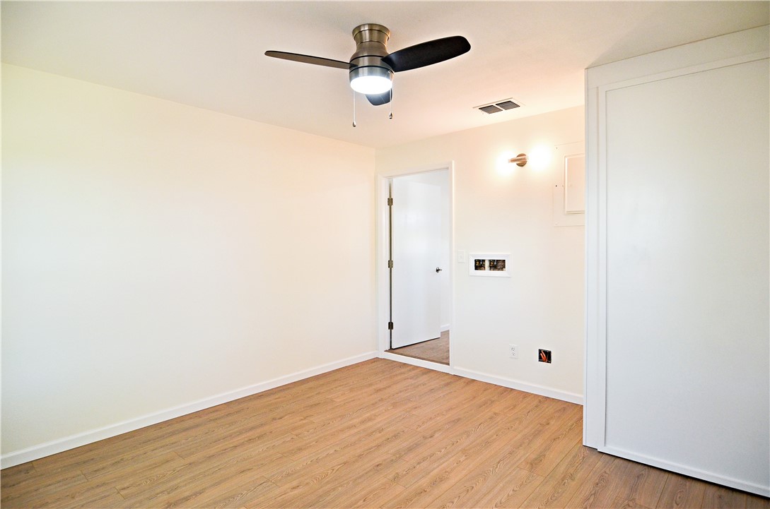 202 Ranch Road Mathis, TX 78368 - Photo 22 of 36 a view of empty room with wooden floor