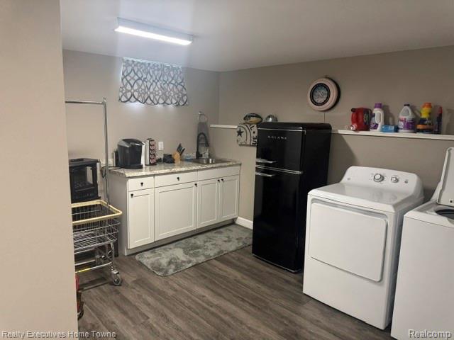 1467 Krafft Road, Unit 8 Port Huron, MI 48060 - Photo 26 of 28 Laundry area featuring wood-finish flooring, white cabinetry, a light-colored countertop, and a utility sink