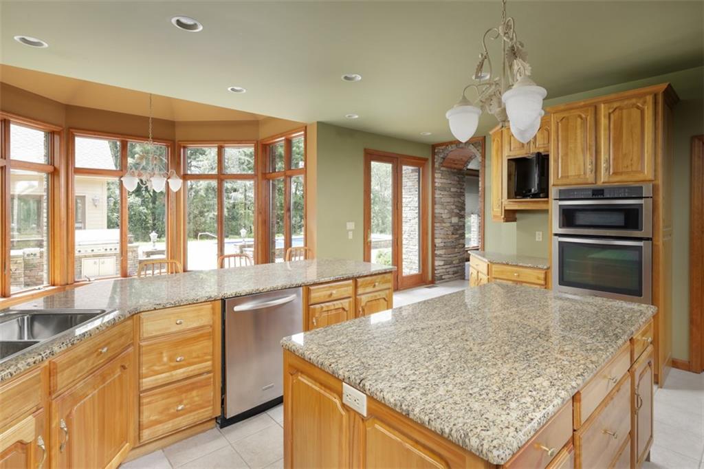 105 Serena Road Ligonier, PA 15658 - Photo 11 of 42 Large granite kitchen with built in appliances along with a large walk in pantry.