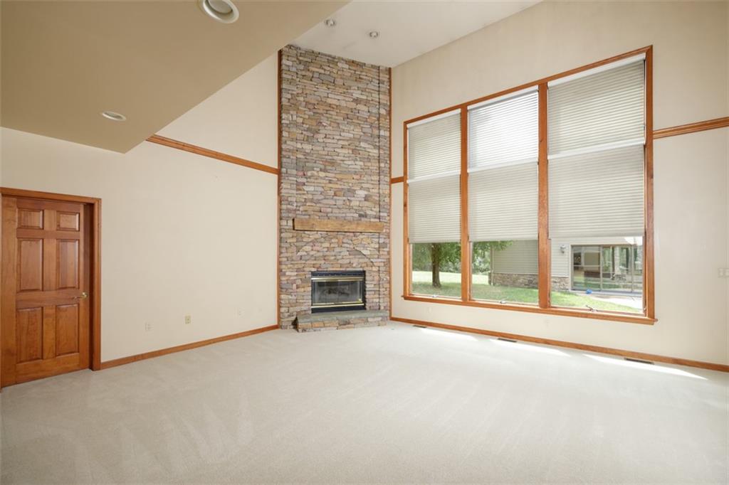 105 Serena Road Ligonier, PA 15658 - Photo 15 of 42 Awesome stone fireplace in hte family room