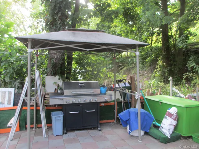 a view of outdoor space yard deck and outdoor kitchen