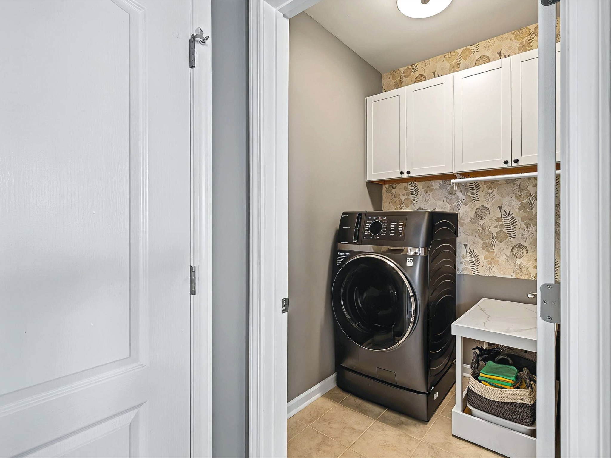 141 Tipton Pass Spring Hill, TN 37174 - Photo 15 of 49 a utility room with sink dryer and washer