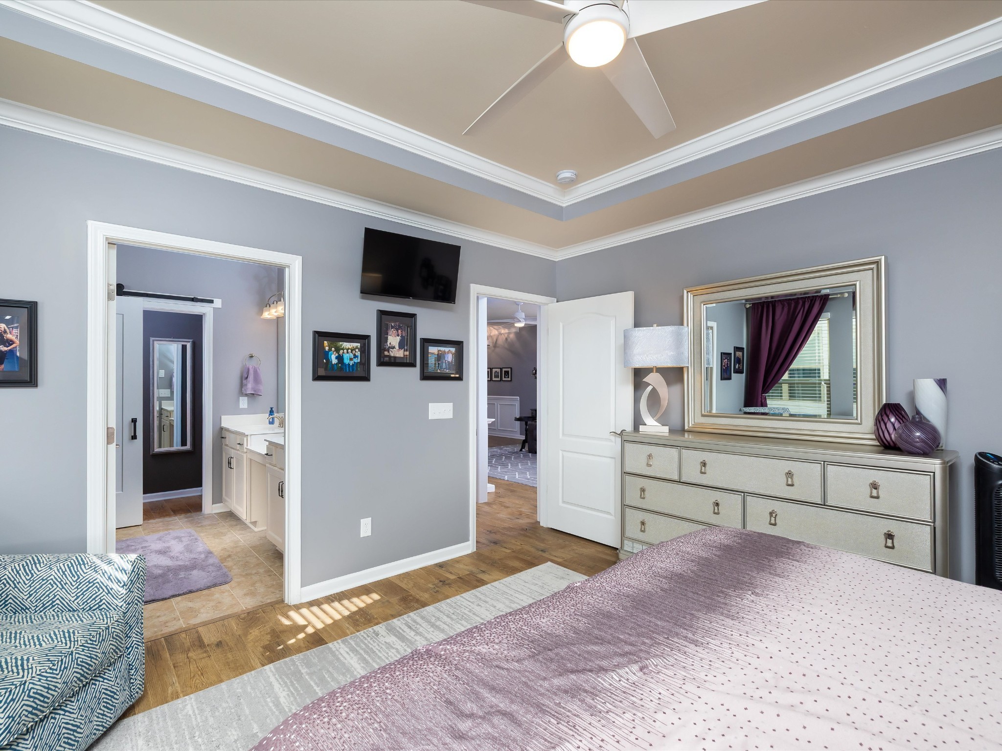 141 Tipton Pass Spring Hill, TN 37174 - Photo 17 of 49 a bedroom with a bed and a dresser