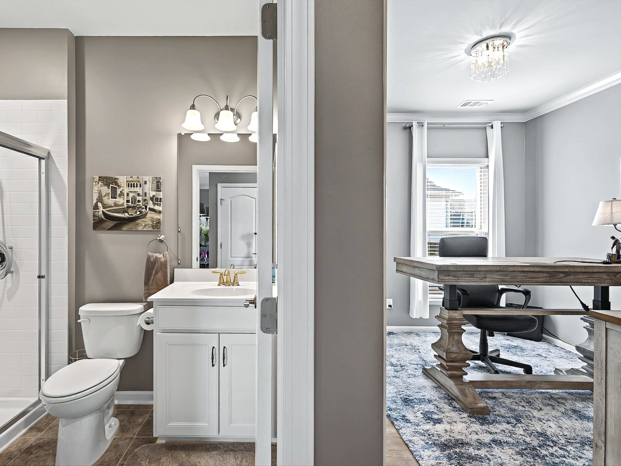 141 Tipton Pass Spring Hill, TN 37174 - Photo 20 of 49 a bathroom with a sink toilet and mirror