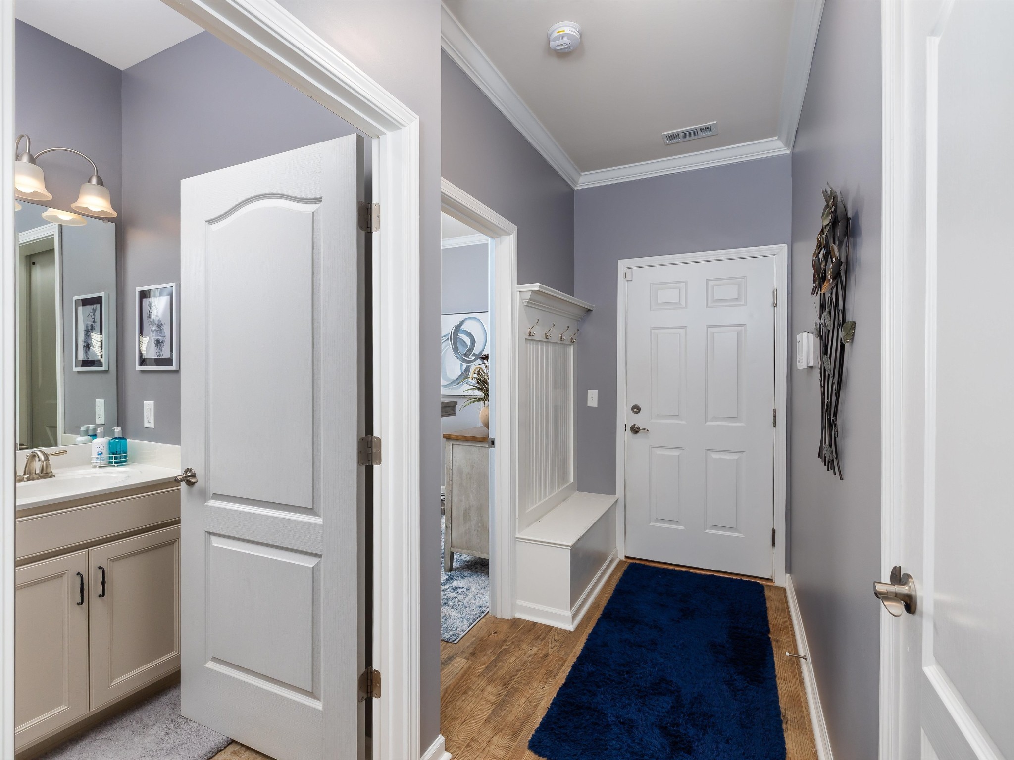 141 Tipton Pass Spring Hill, TN 37174 - Photo 24 of 49 a bathroom with a sink and a mirror