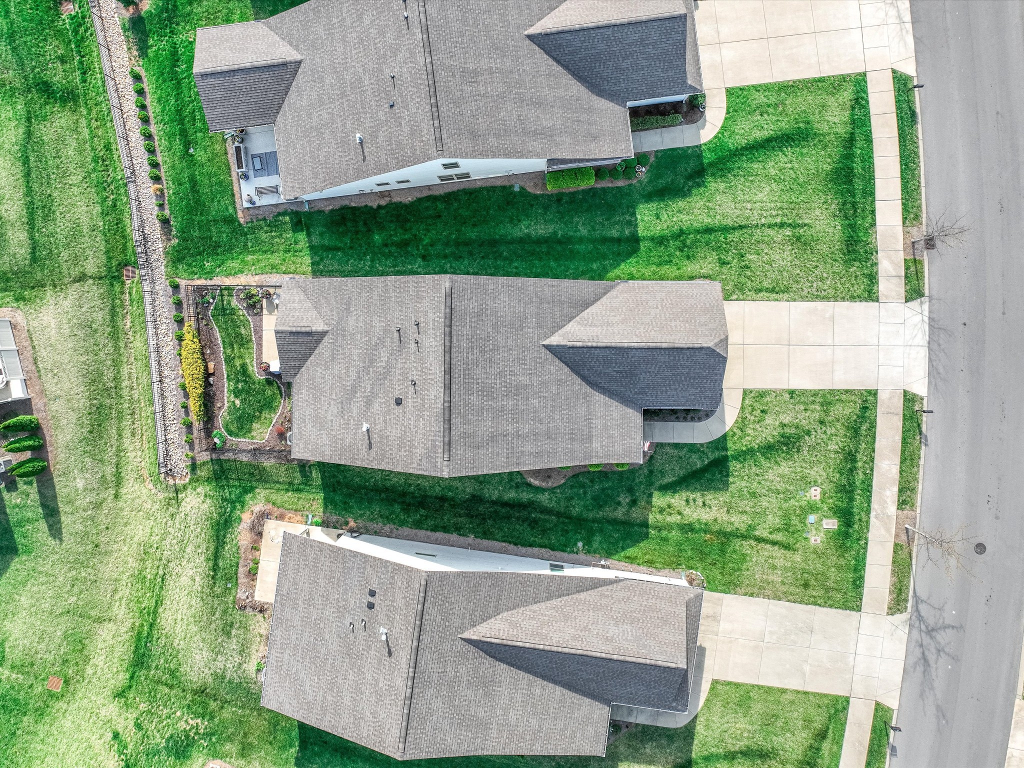 141 Tipton Pass Spring Hill, TN 37174 - Photo 39 of 49 an aerial view of a house with a garden