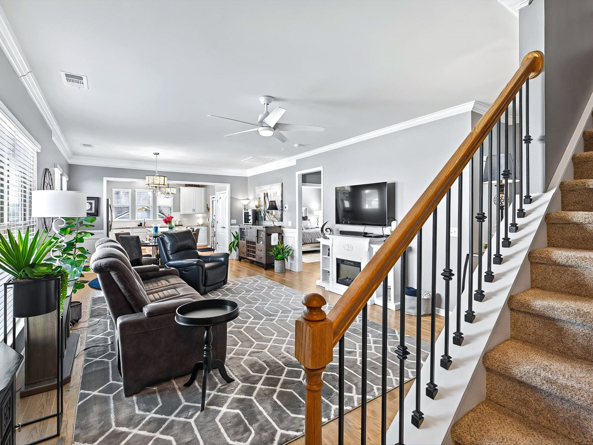 141 Tipton Pass Spring Hill, TN 37174 - Photo 5 of 49 a living room with furniture potted plant and a potted plant