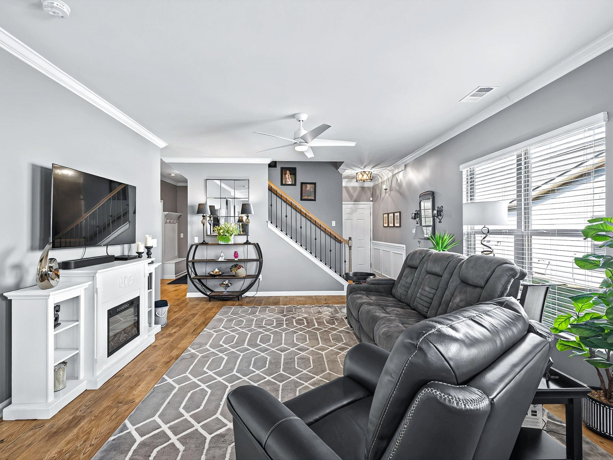 141 Tipton Pass Spring Hill, TN 37174 - Photo 6 of 49 a living room with furniture and a flat screen tv