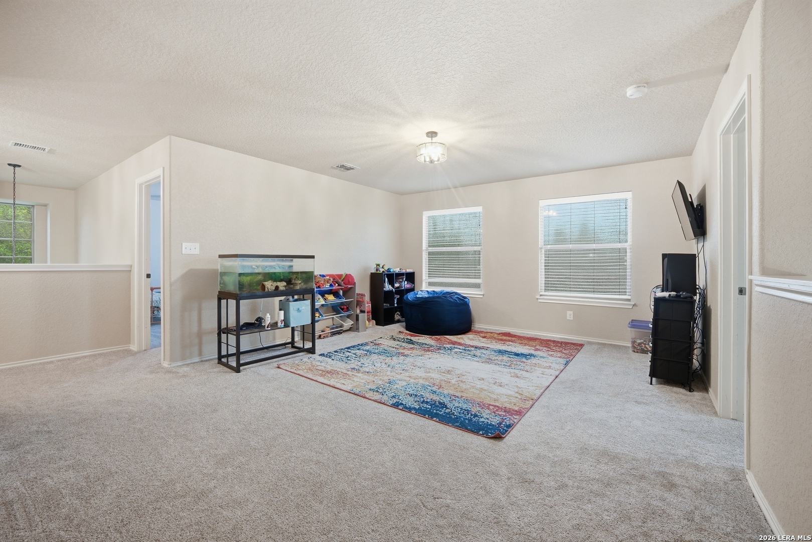 313 Brook Shadow Cibolo, TX 78108 - Photo 18 of 29 a view of livingroom with furniture and windows