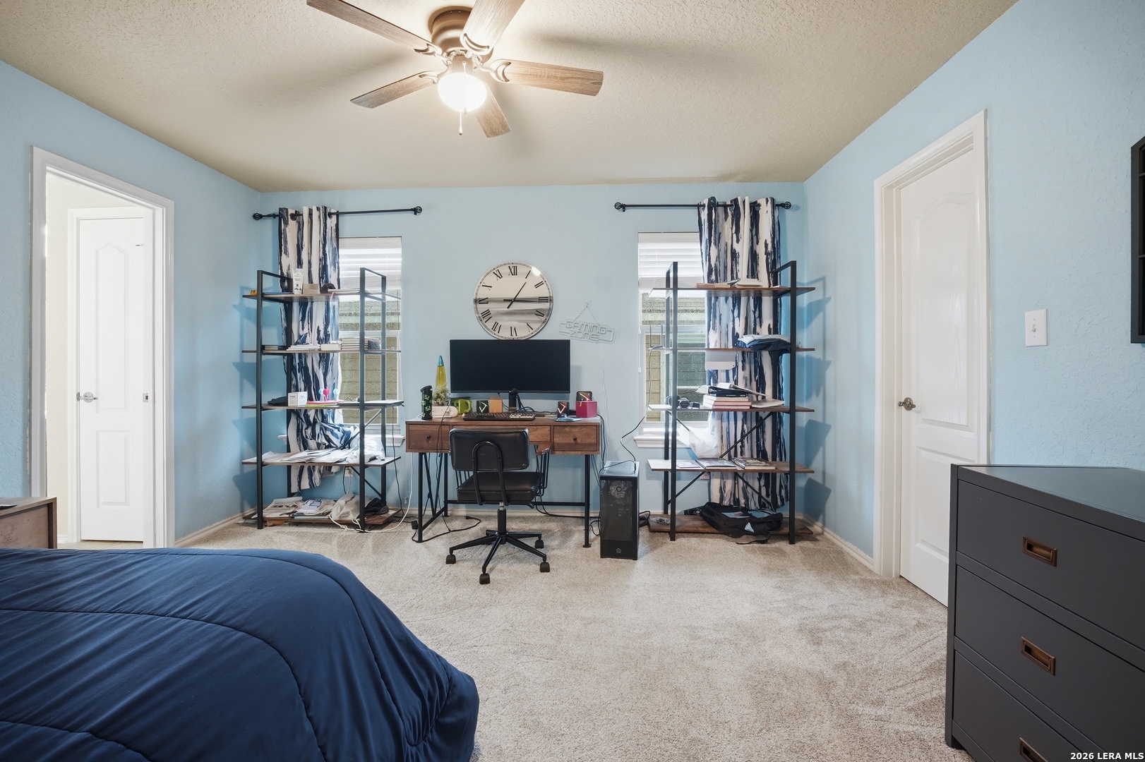 313 Brook Shadow Cibolo, TX 78108 - Photo 22 of 29 a bedroom with a workspace