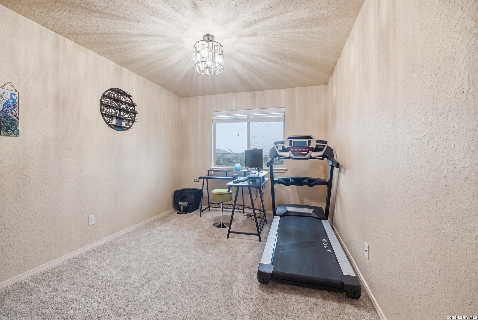 313 Brook Shadow Cibolo, TX 78108 - Photo 23 of 29 a room with furniture and a chandelier