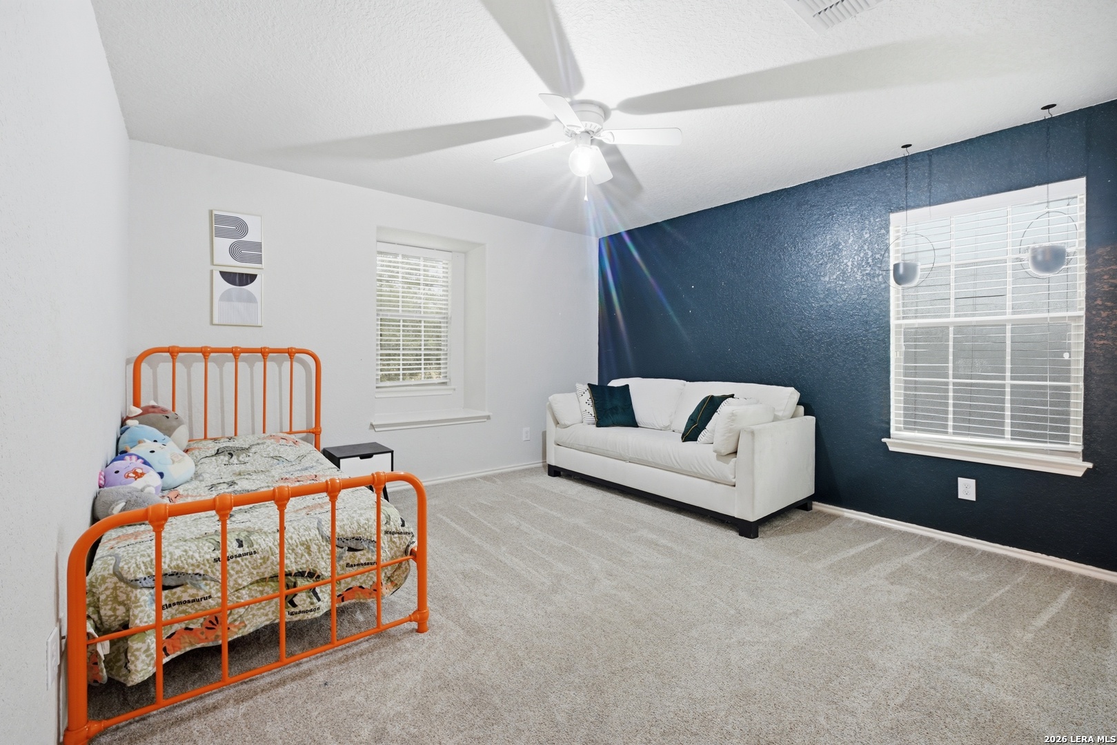313 Brook Shadow Cibolo, TX 78108 - Photo 24 of 29 a bedroom with a bed and a window