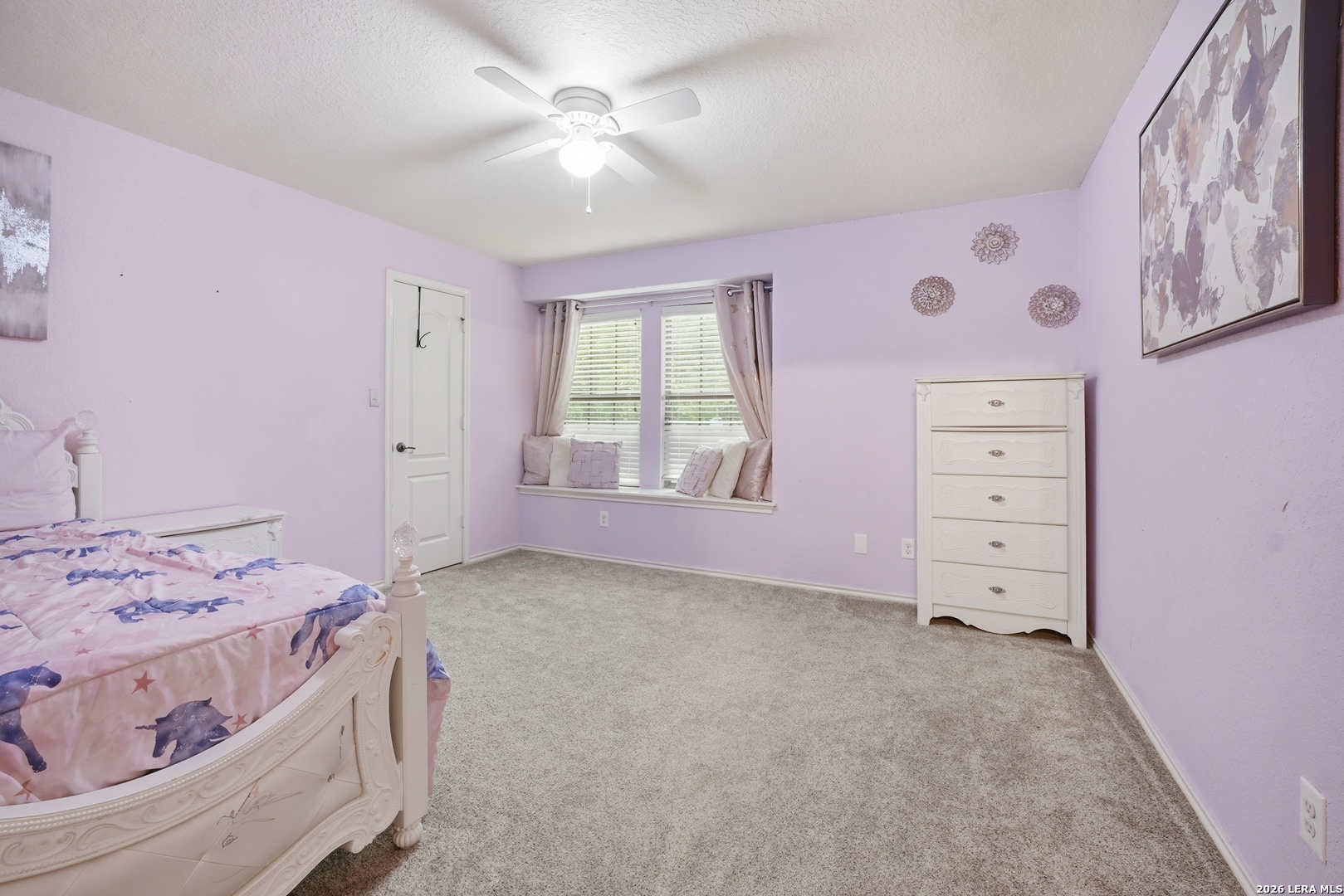 313 Brook Shadow Cibolo, TX 78108 - Photo 26 of 29 a view of a bedroom with a bed and a window