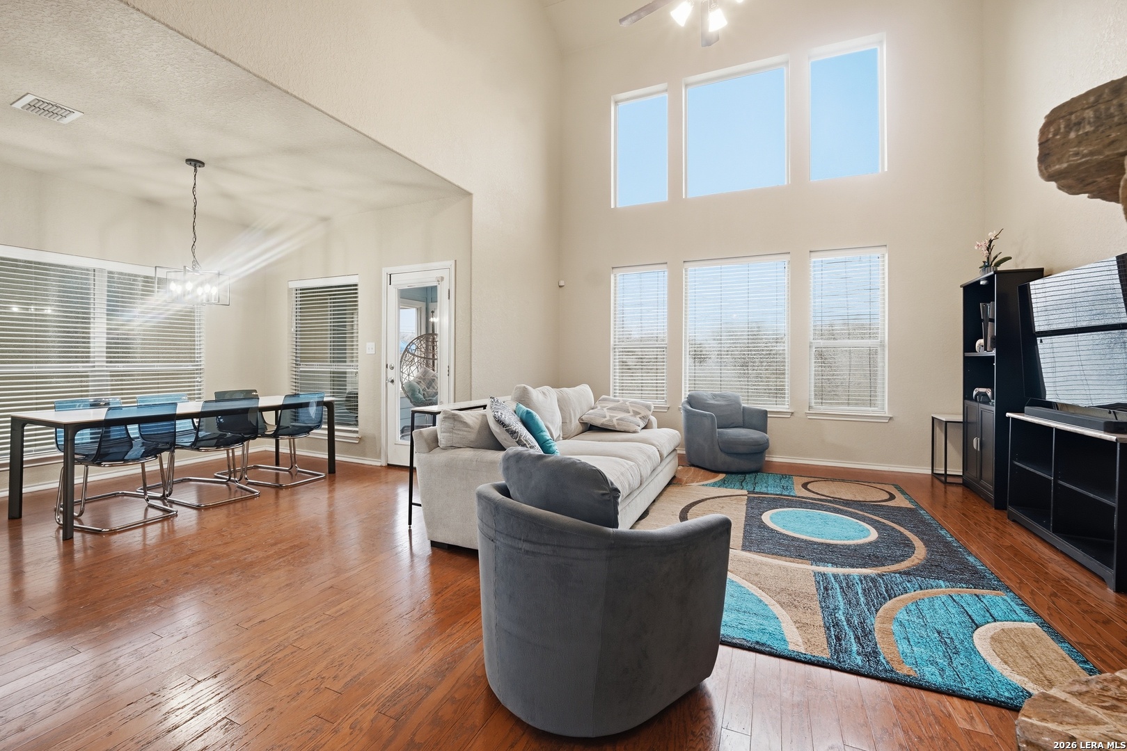 313 Brook Shadow Cibolo, TX 78108 - Photo 3 of 29 a living room with furniture and a wooden floor