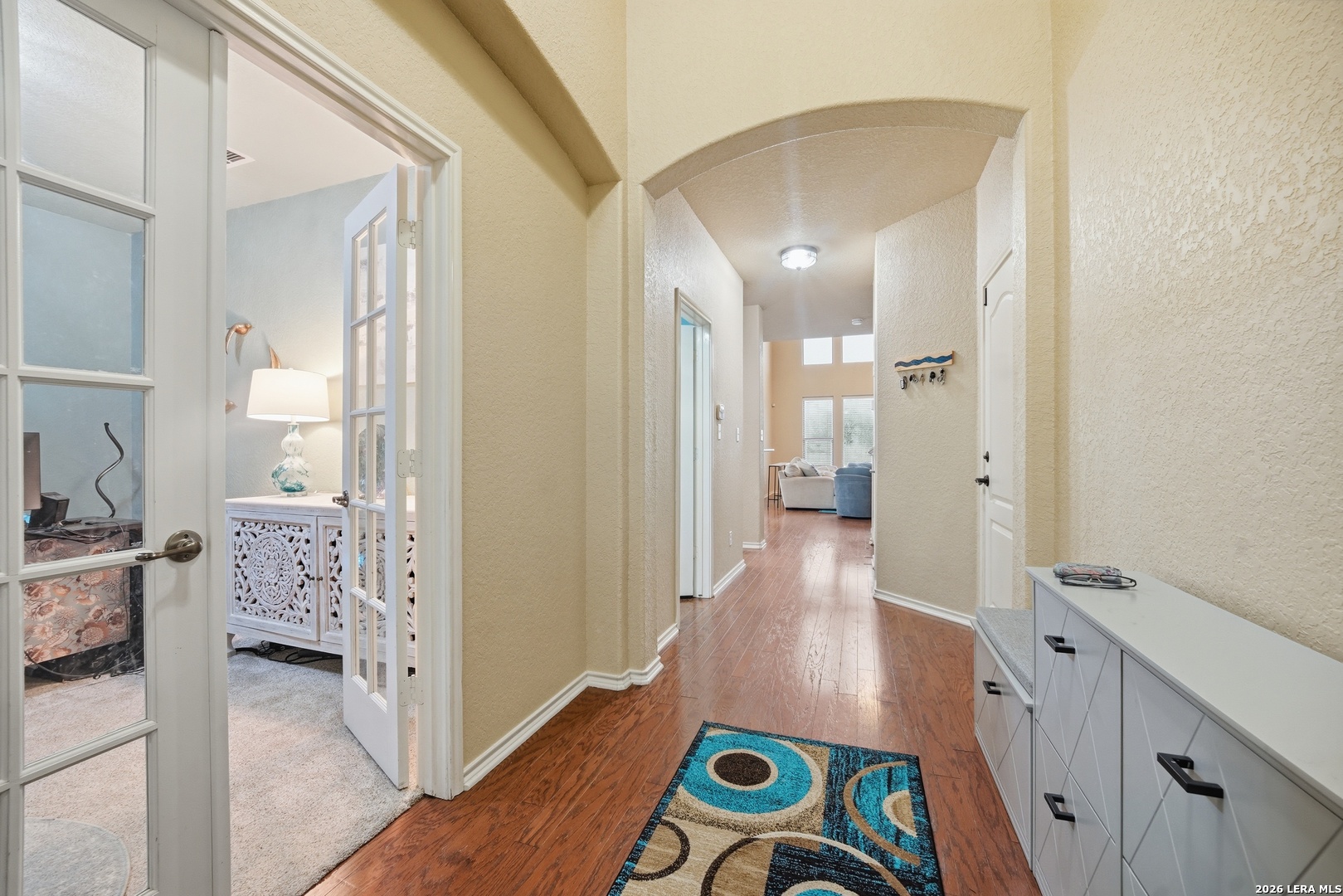 313 Brook Shadow Cibolo, TX 78108 - Photo 4 of 29 a view of hallway with wooden floor