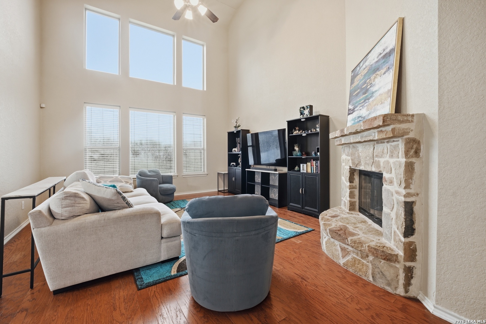313 Brook Shadow Cibolo, TX 78108 - Photo 10 of 29 a living room with furniture and a fireplace