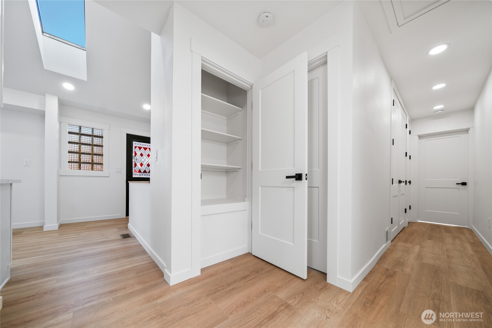 1308 19th Avenue Longview, WA 98632 - Photo 12 of 24 a view of hallway with wooden floor
